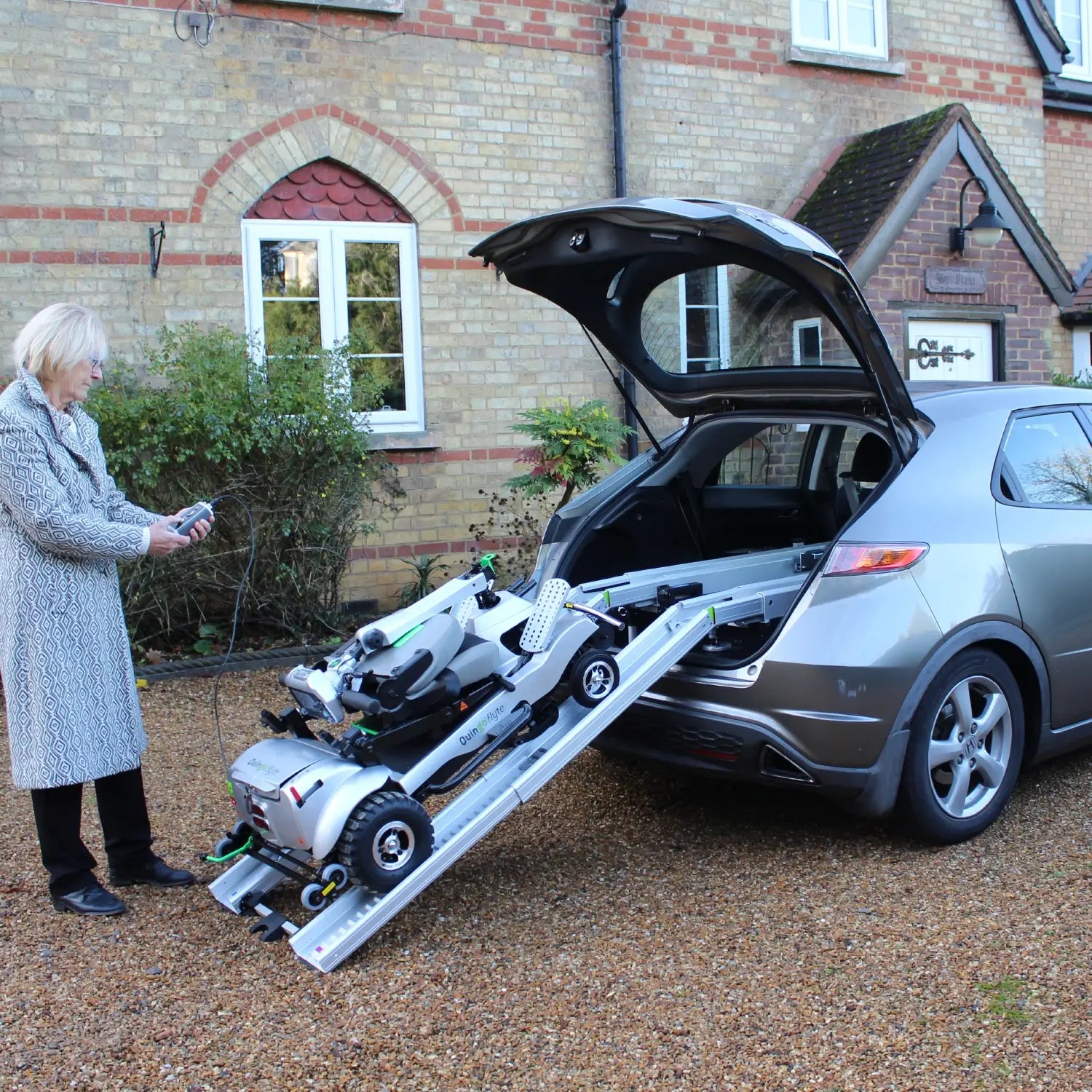 Dark Gray Quingo Flyte Mobility Scooter With MK2 Self Loading Ramp