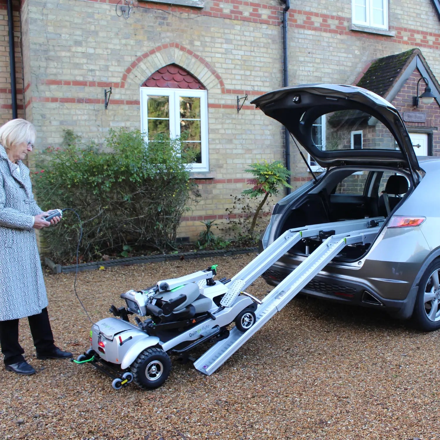 Dark Gray Quingo Flyte Mobility Scooter With MK2 Self Loading Ramp